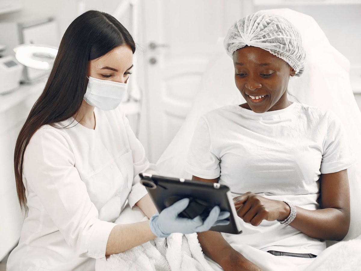 Clinician documenting on a tablet